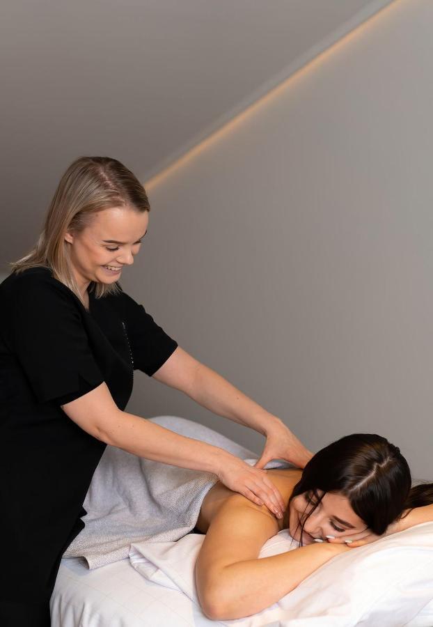Runo Hotel Порво Екстериор снимка A chiropractor treating a patient